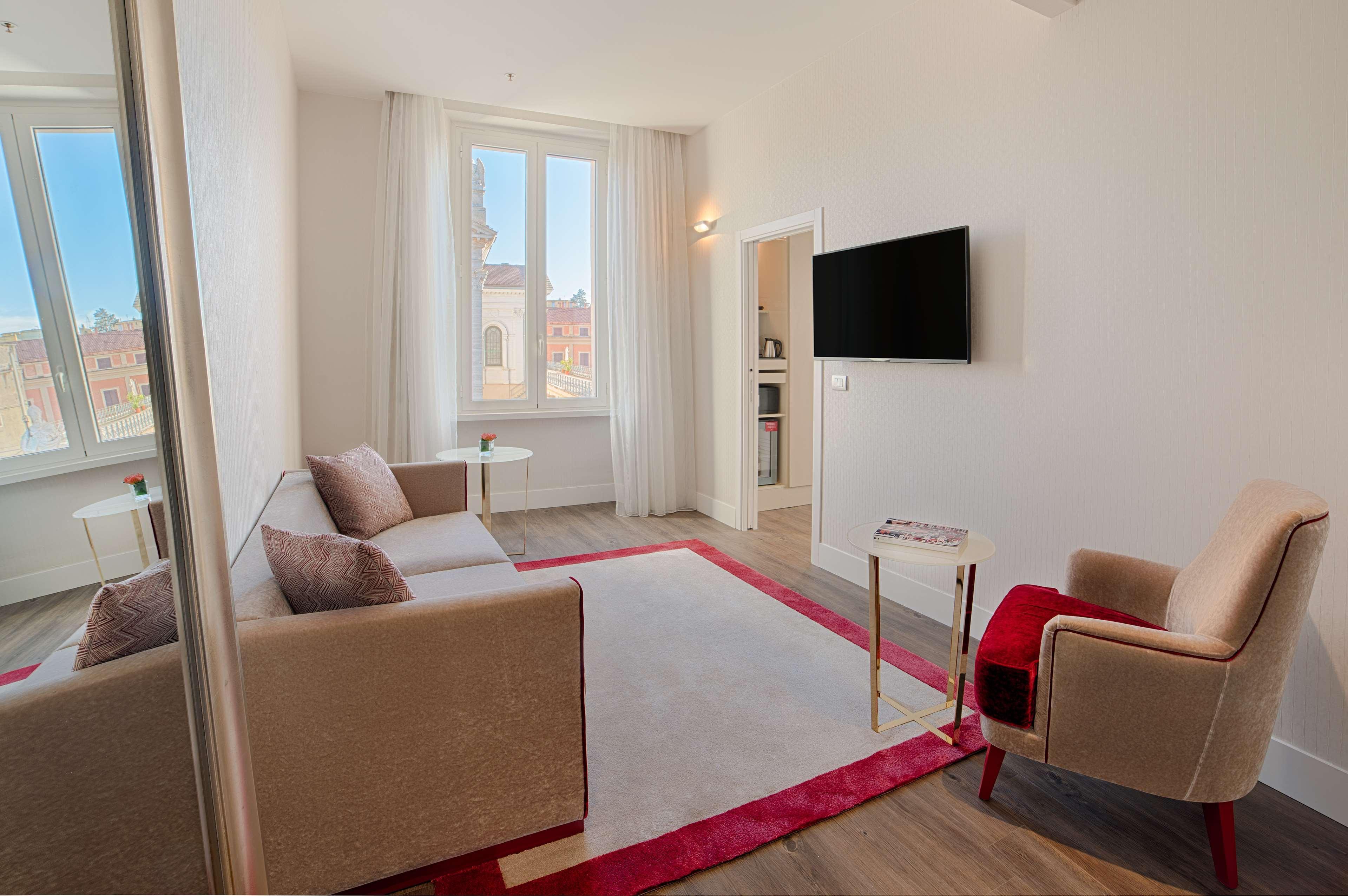 Hotel NH Collection Palazzo Cinquecento Roma Esterno foto A staged photo of a living room